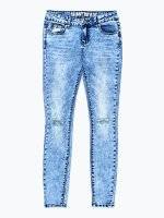 Ripped knees skinny jeans in blue wash