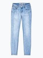Distressed skinny jeans in light blue wash