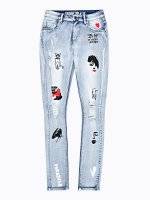 Damaged skinny jeans with prints