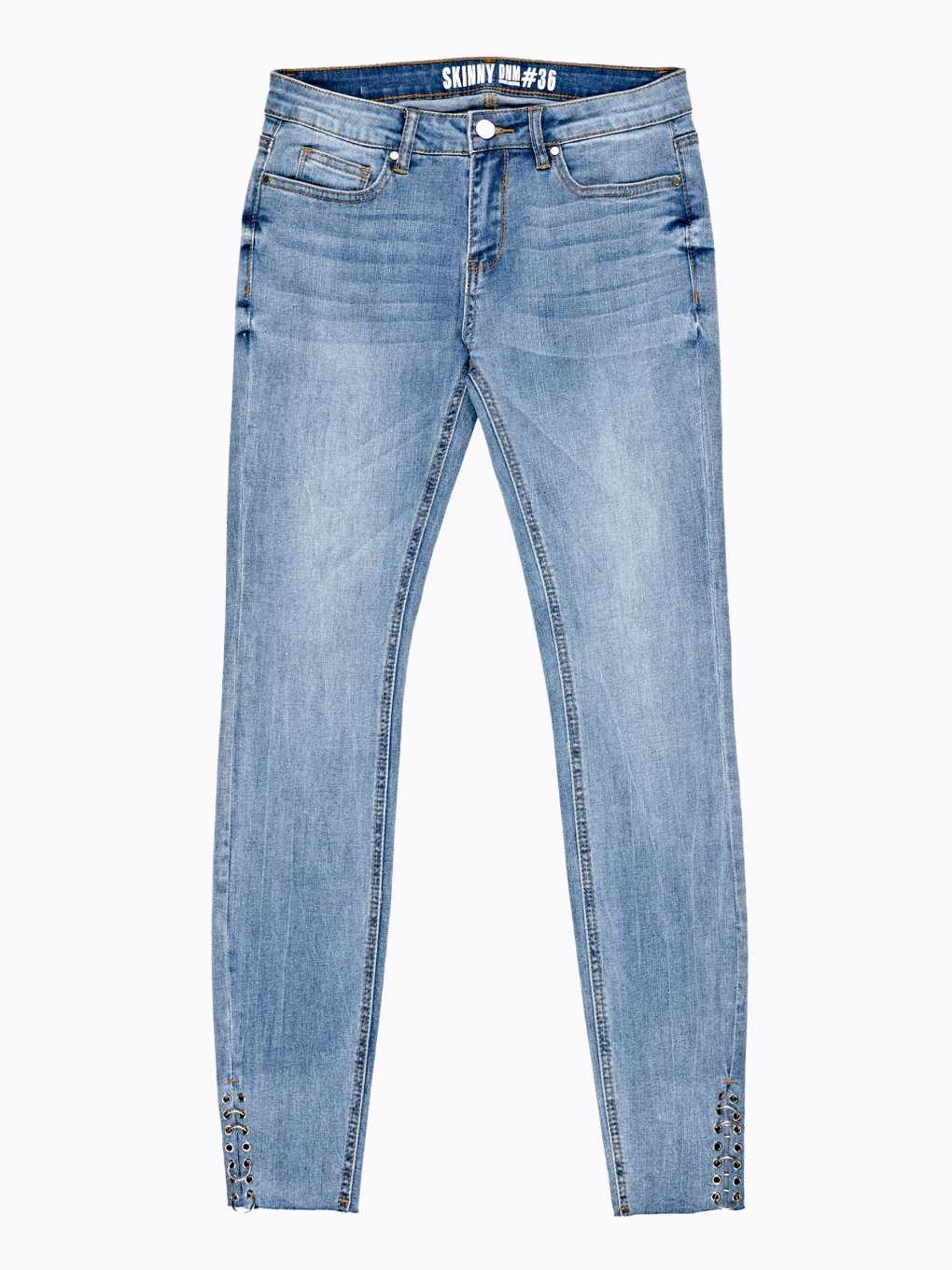 Skinny jeans with metal rings