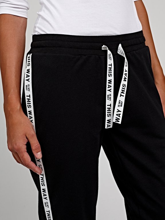 Sweatpants with printed tape