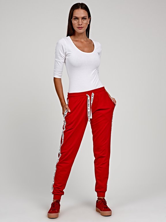 Sweatpants with printed tape