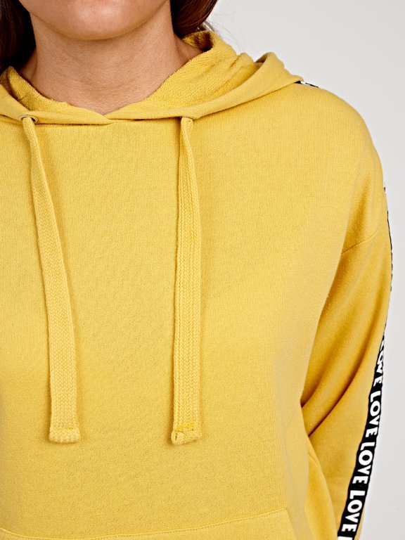 Hoodie with decorative sleeve tape