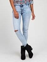 Ripped knee skinny jeans with zipper pockets