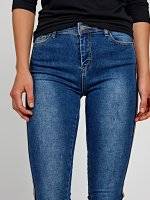 Skinny jeans with decorative tape