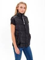 Quilted padded vest with pom-pom detail