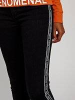 Skinny jeans with printed side tape