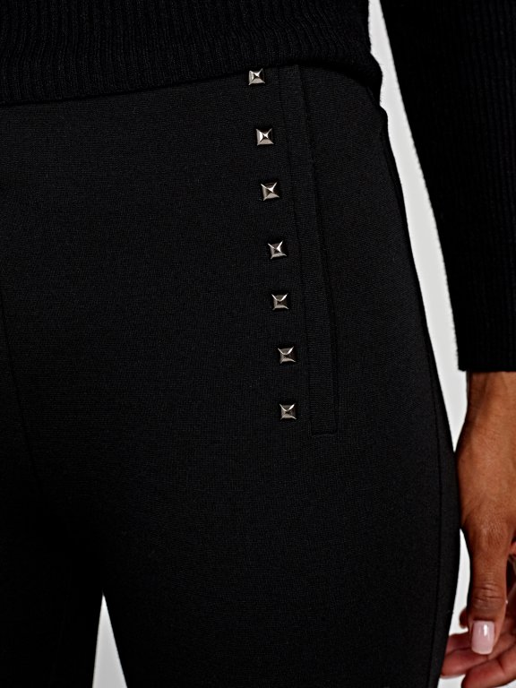 Knitted slim trousers with studs