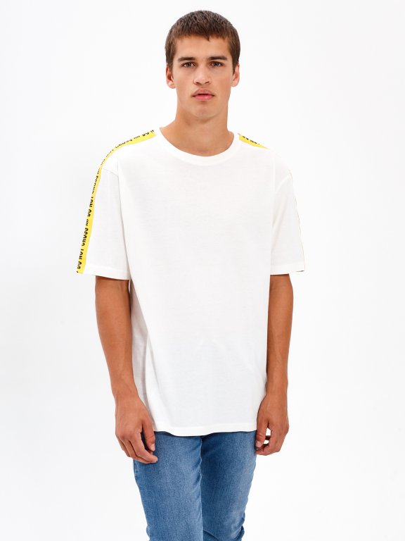 OVERSIZED T-SHIRT WITH SLEEVE TAPES