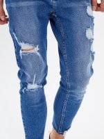 Slim fit tapered jeans with raw hem