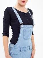 Long dungaree in light blue wash