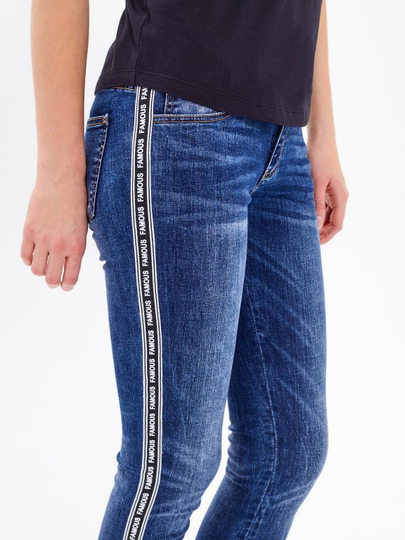 Taped skinny jeans