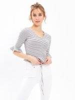 STRIPED TOP WITH RUFFLES