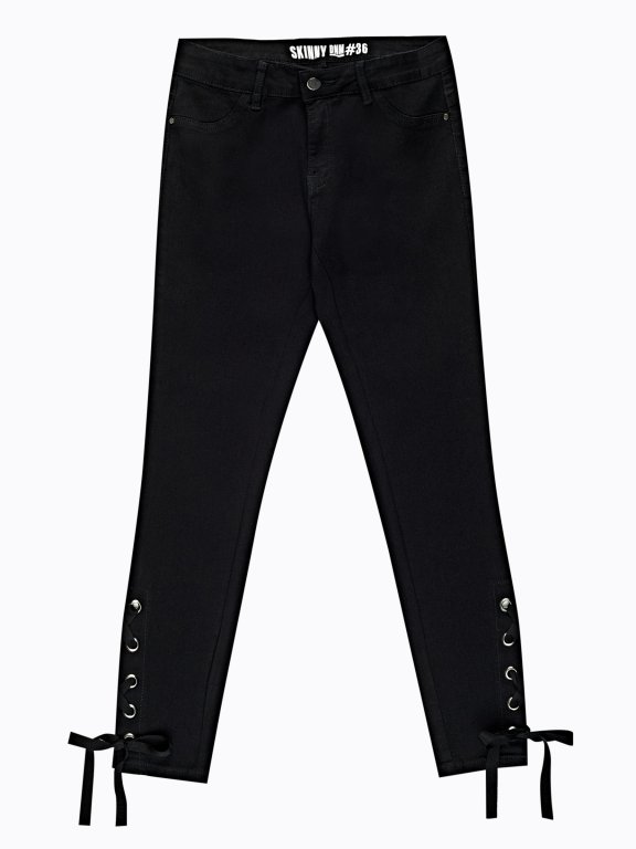 Skinny jeans with lace-up detail on hems