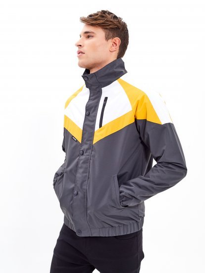 Paneled jacket with stand-up collar