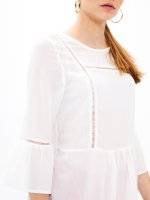 Peplum blouse with ruffle sleeve