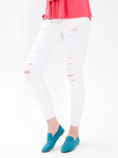 Distressed skinny trousers