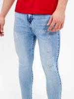 CARROT FIT DISTRESSED JEANS