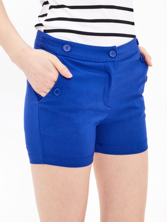 Shorts with decorative buttons