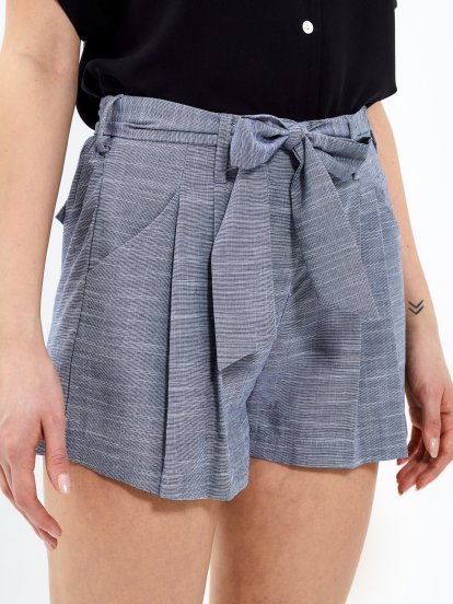 Shorts with decorative belt