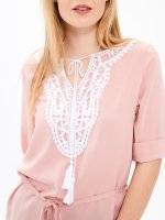 Longline striped blouse with crochet details