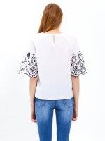 Cotton blouse with embroidered sleeves