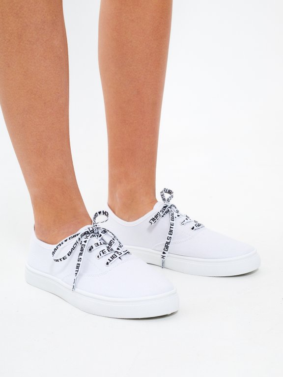 Plimsolls with printed shoelaces