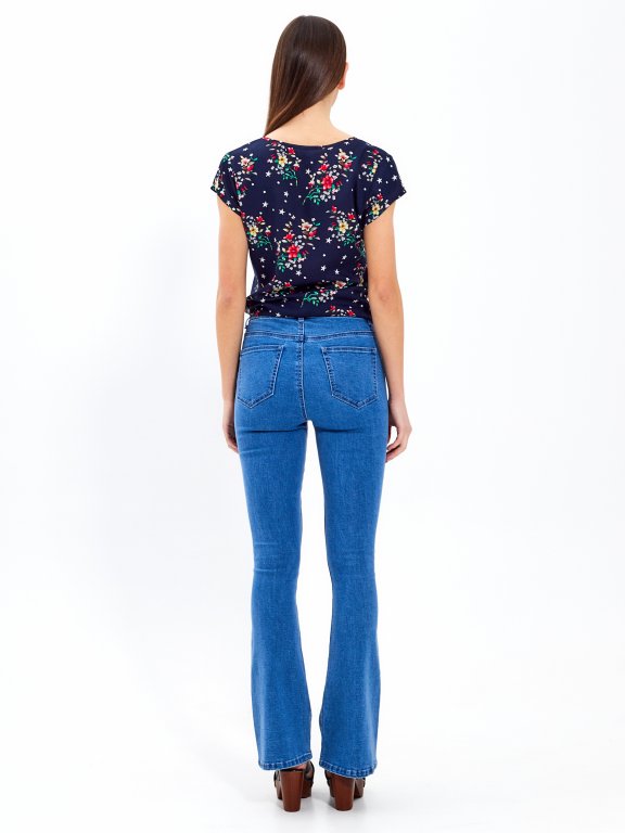 Flared jeans in mid blue wash