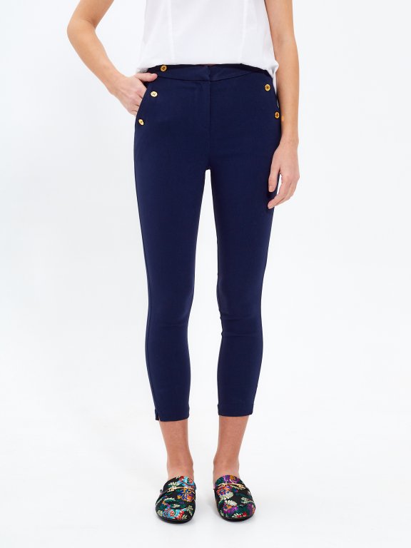 High waisted slim trousers with decorative buttons