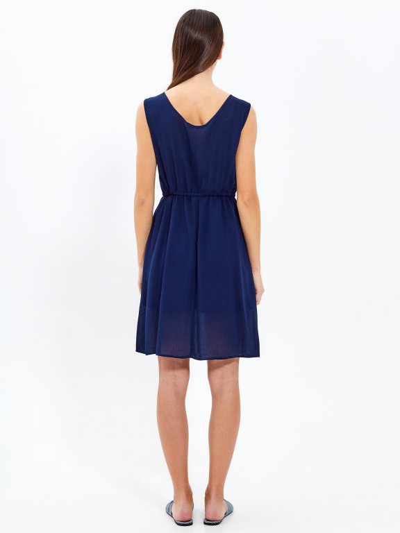 Sleeveless dress with contrast croched detail