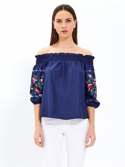Off-the-shoulder blouse with embroidered sleeve