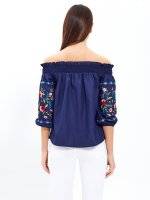 Off-the-shoulder blouse with embroidered sleeve