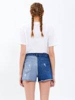 Denim shorts with reversed pannels