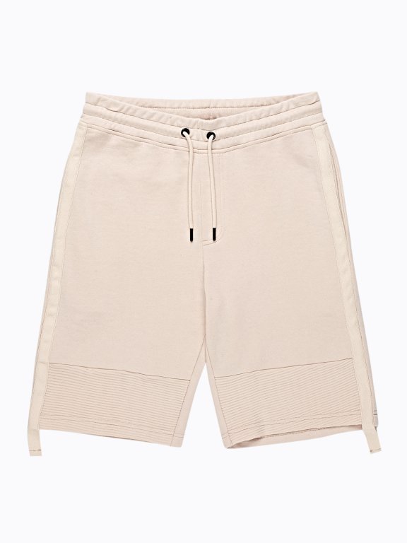 SWEAT SHORTS WITH TAPE