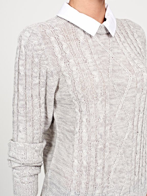 Layered cable-knit sweater