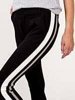 Stretch trousers with double stripe
