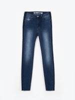 Raw edge skinny jeans