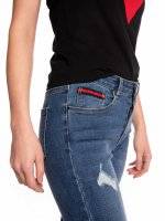 Taped distressed skinny jeans