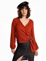 Wrap blouse with round buckle