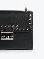 Cross body bag with rivets