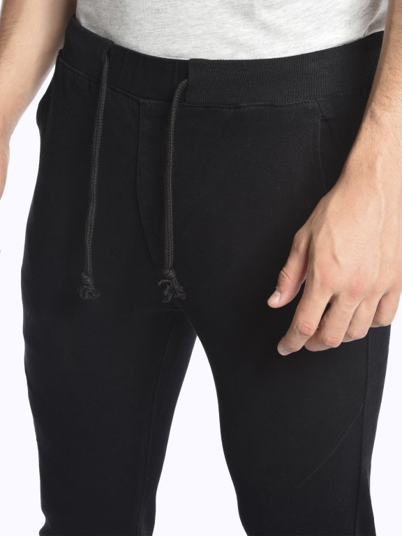 Jednobarevné kalhoty jogger fir