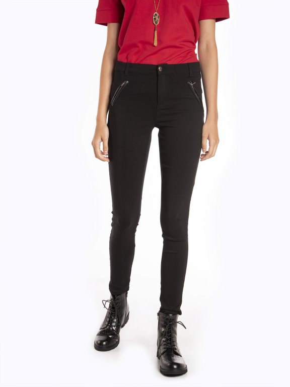 Stretchy skinny trousers with zippers