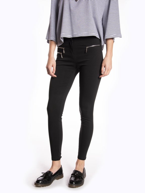 Elastic skinny trousers with shinny zippers