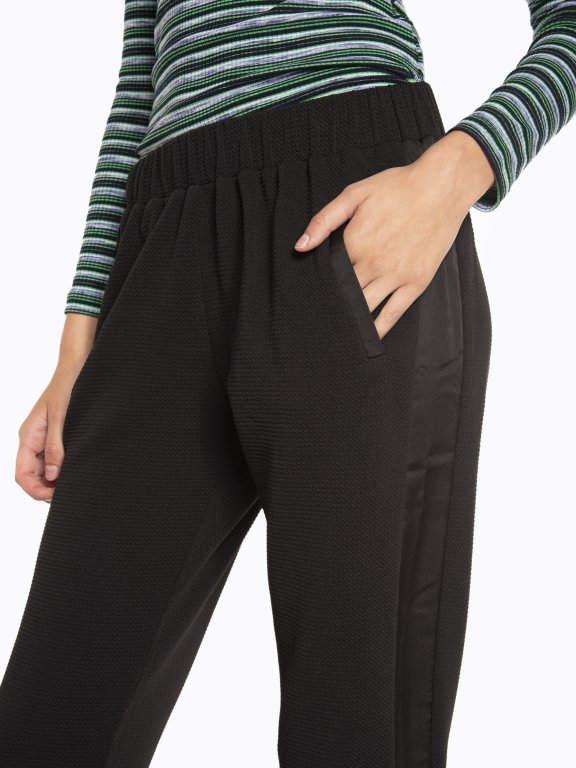 Combined stretchy jogger trousers