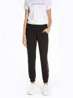 Stretchy jogger trousers with animal print side tape