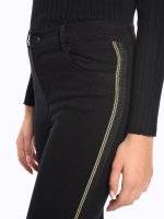 Skinny trousers with gold side tape