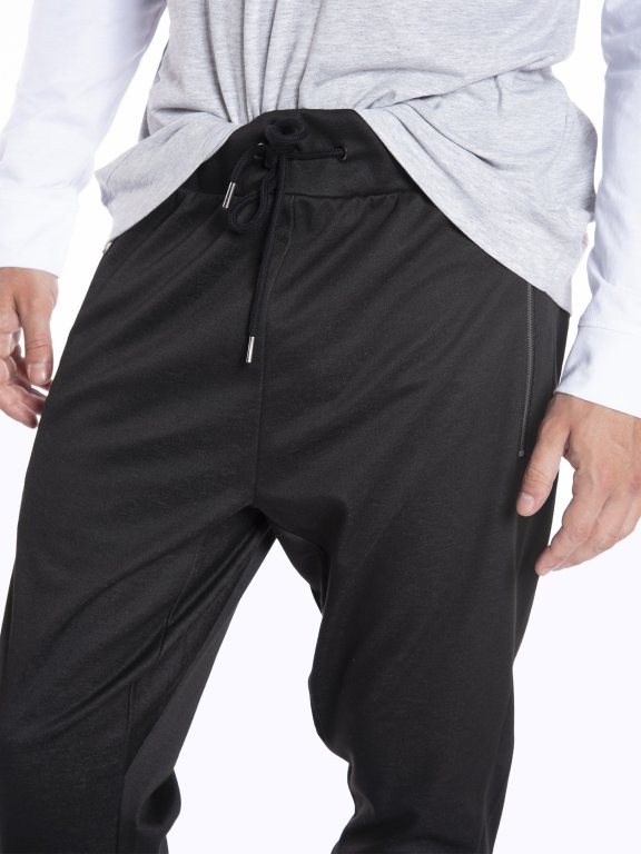 Spodnie dresowe z zamkami