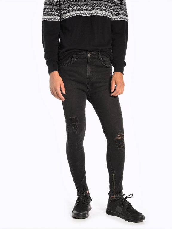 Damaged slim fit cropped jeans with zippers