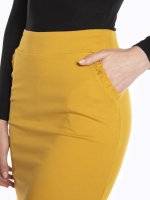 Bodycon mini skirt with ruffles on pockets
