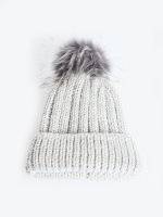 Knitted beanie with faux fur pompom
